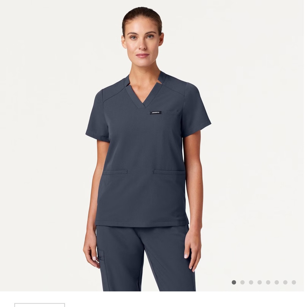 Jaanuu scrub top, carbon grey, classic fit. Worn a few times.